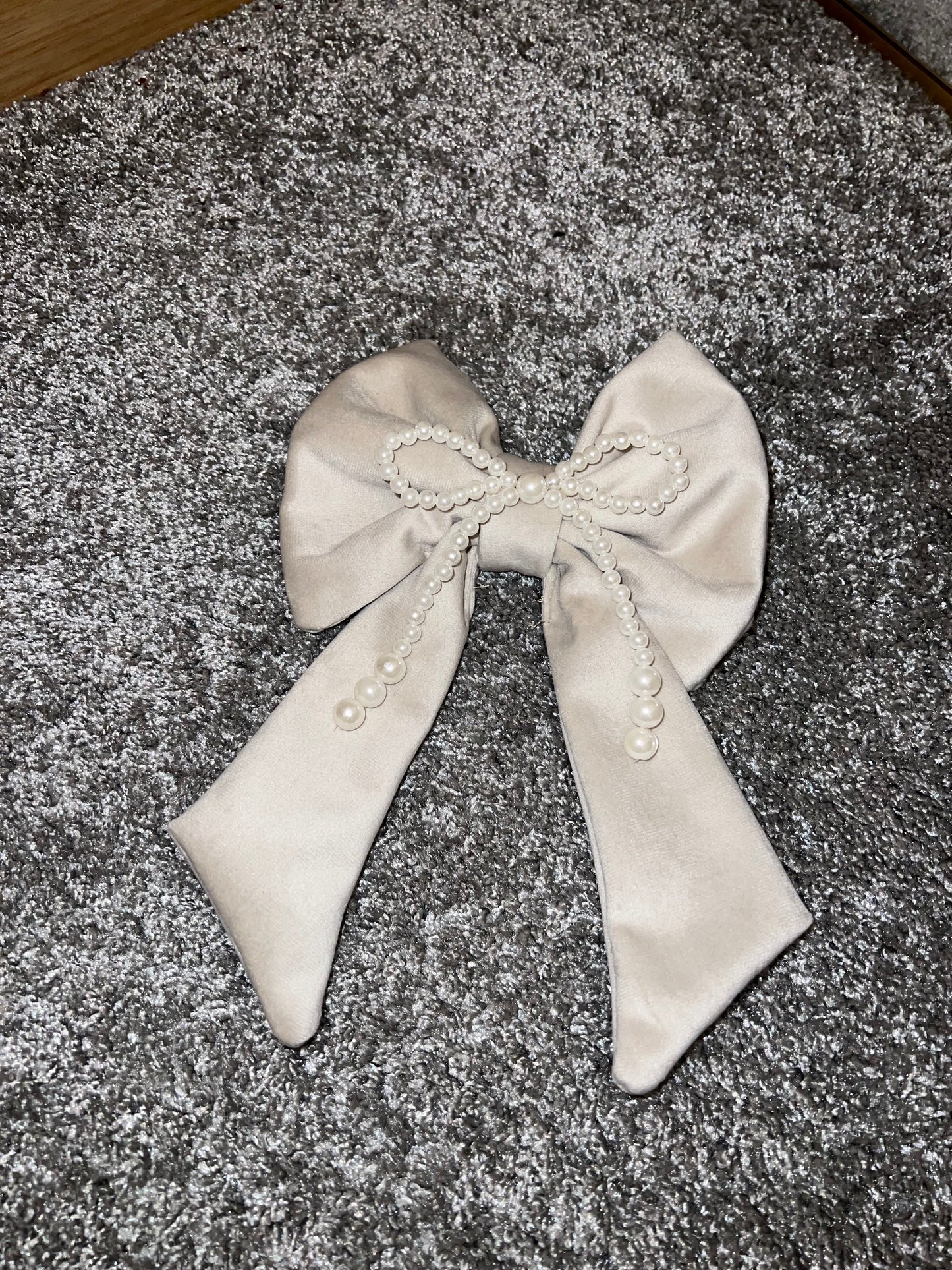 Cream and pearl bow