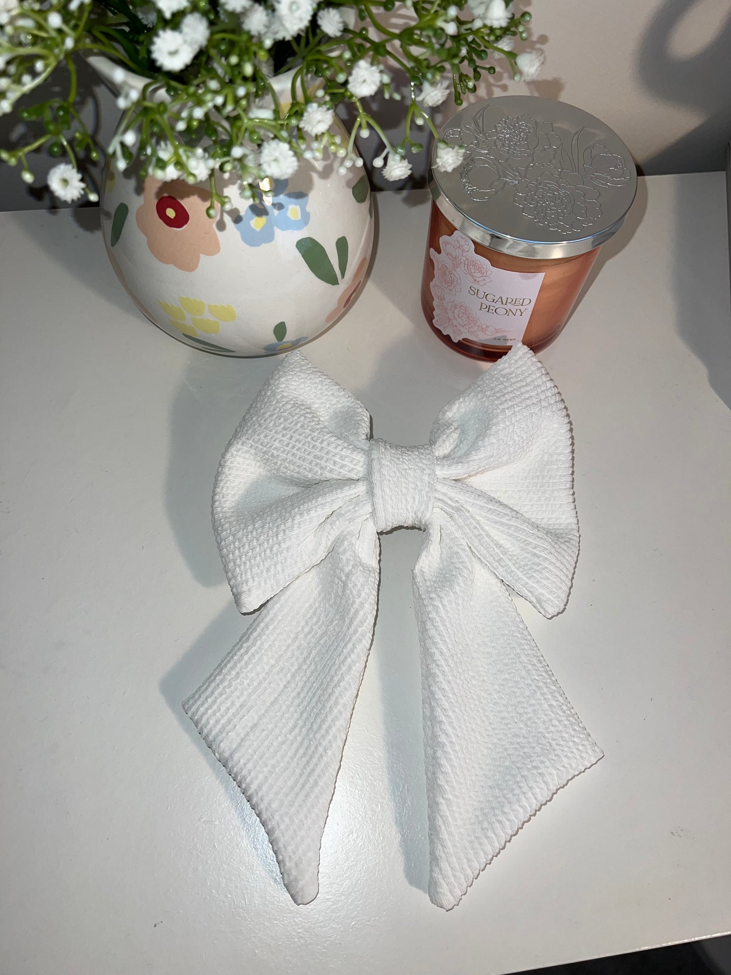 White crinkle bow