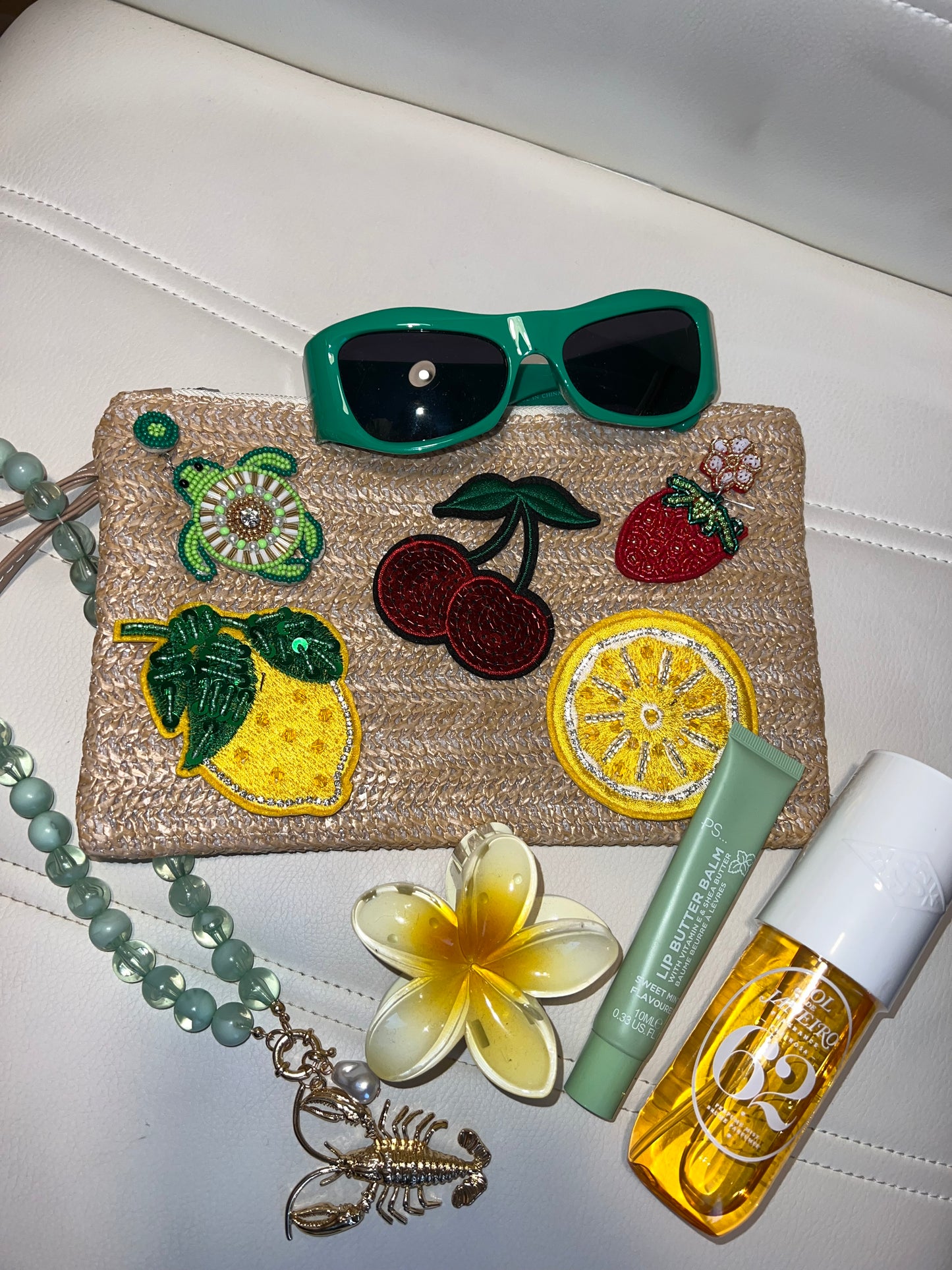 Straw charm bag
