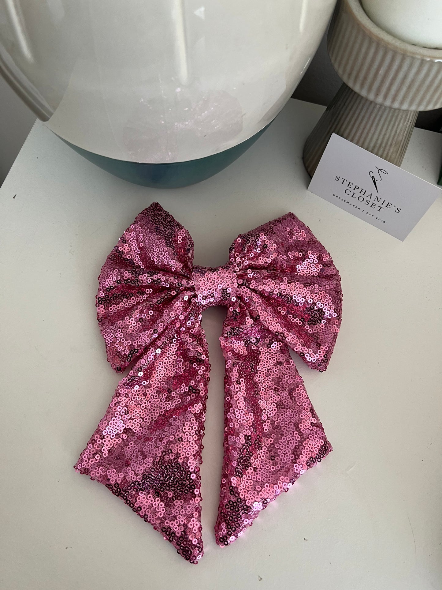 Pink sequin bow