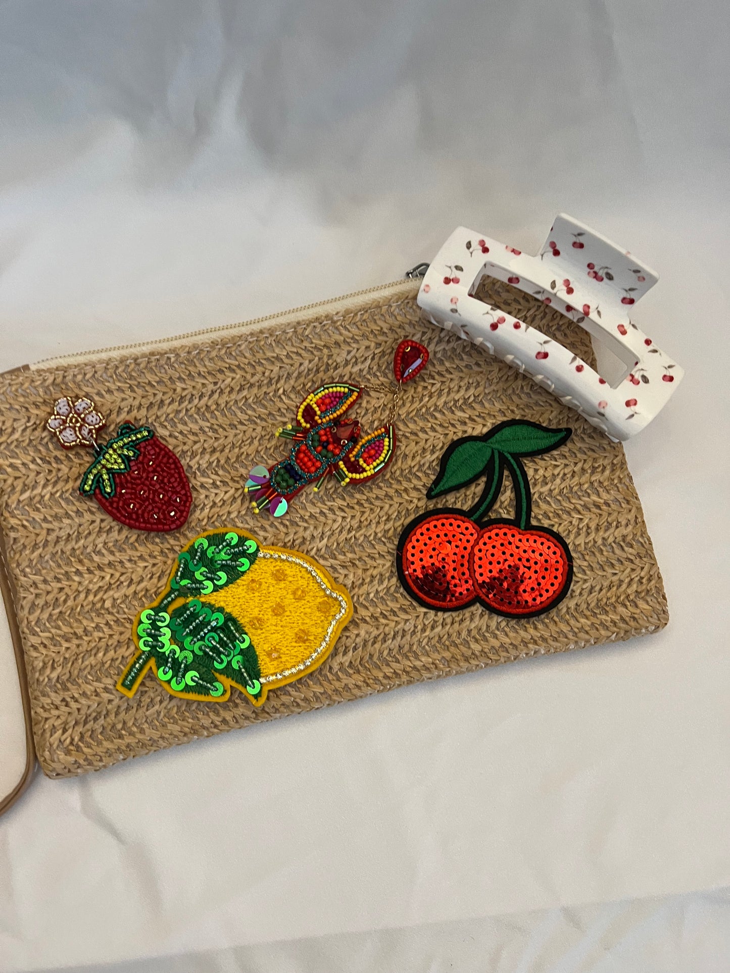 Straw charm bag