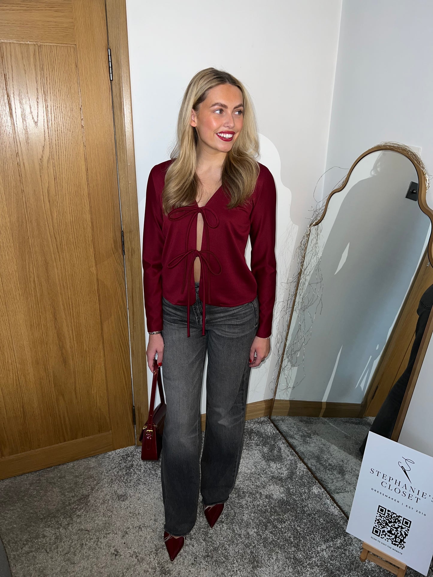 Burgundy bow top.