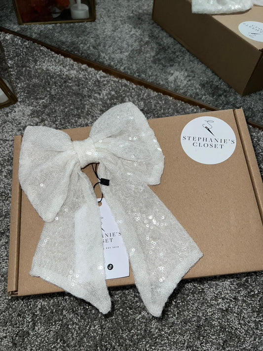 White sequin bow