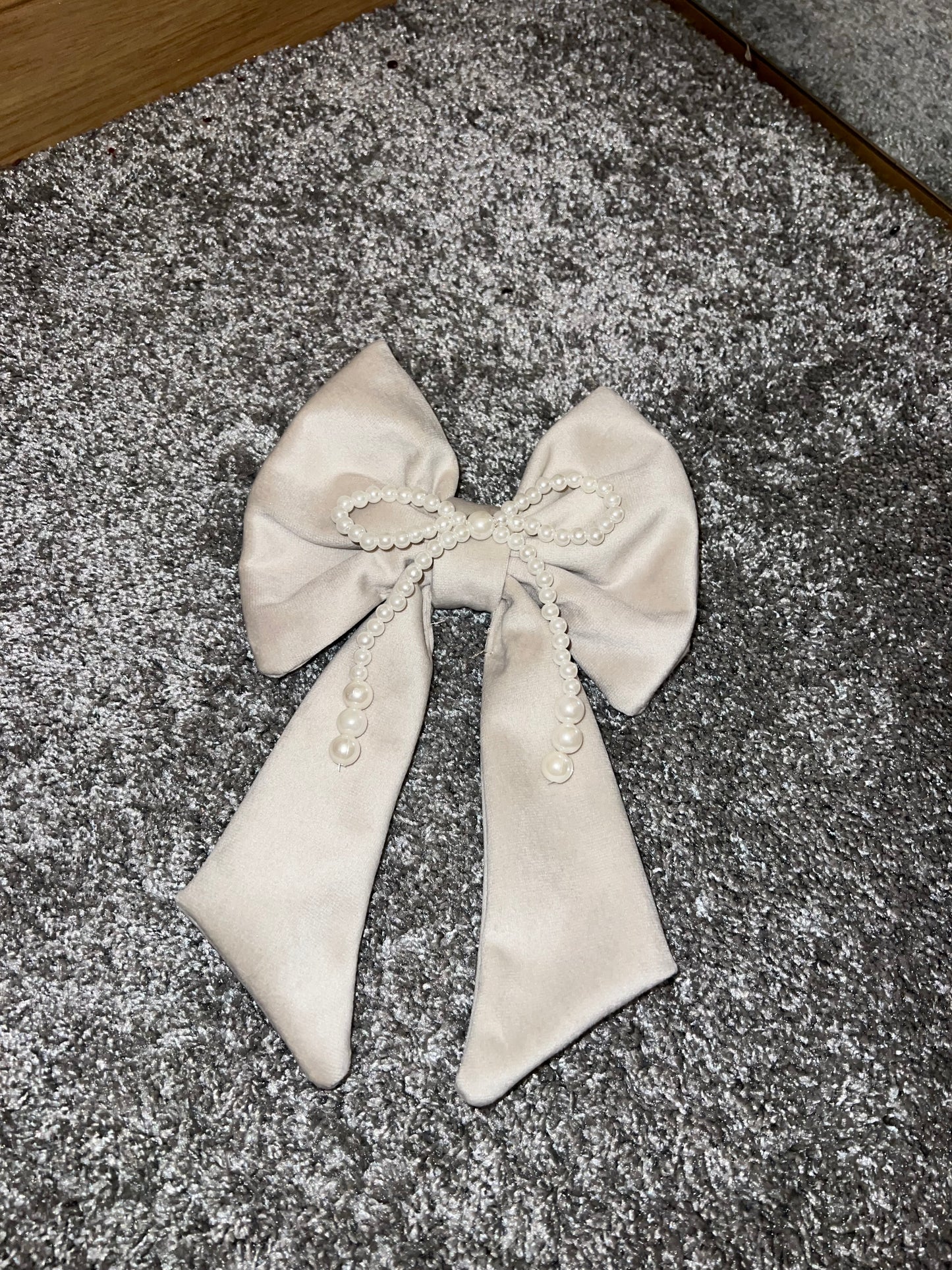 Cream and pearl bow