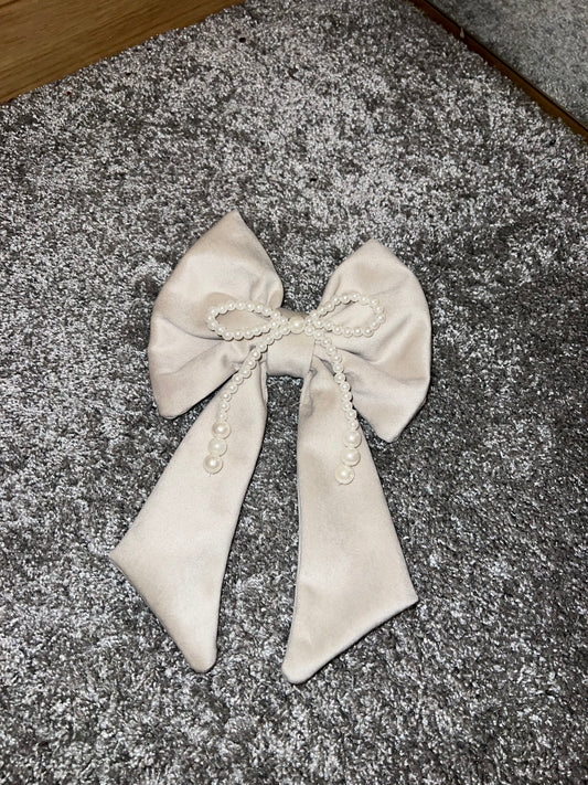 Cream and pearl bow