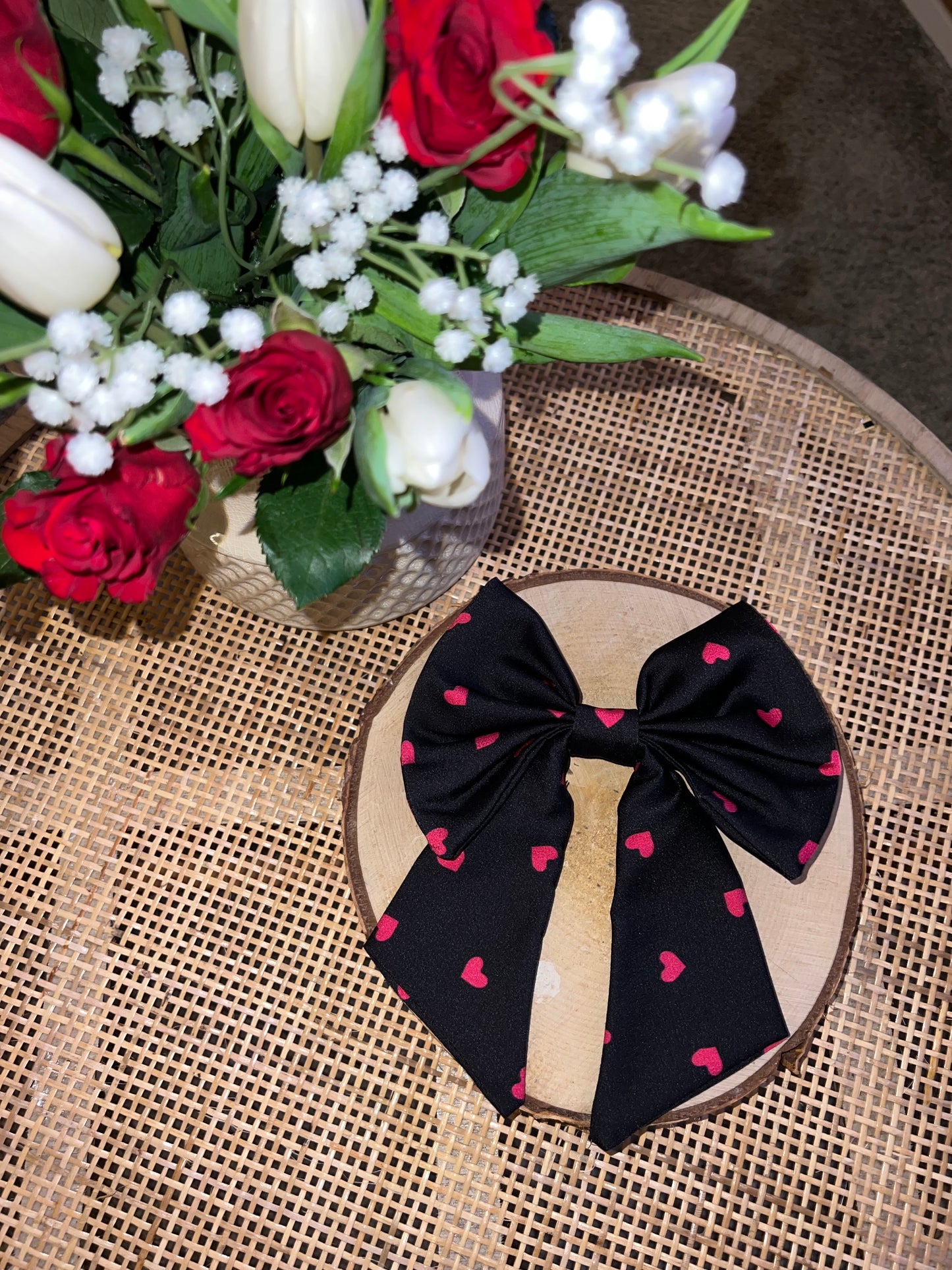 Black love heart bow