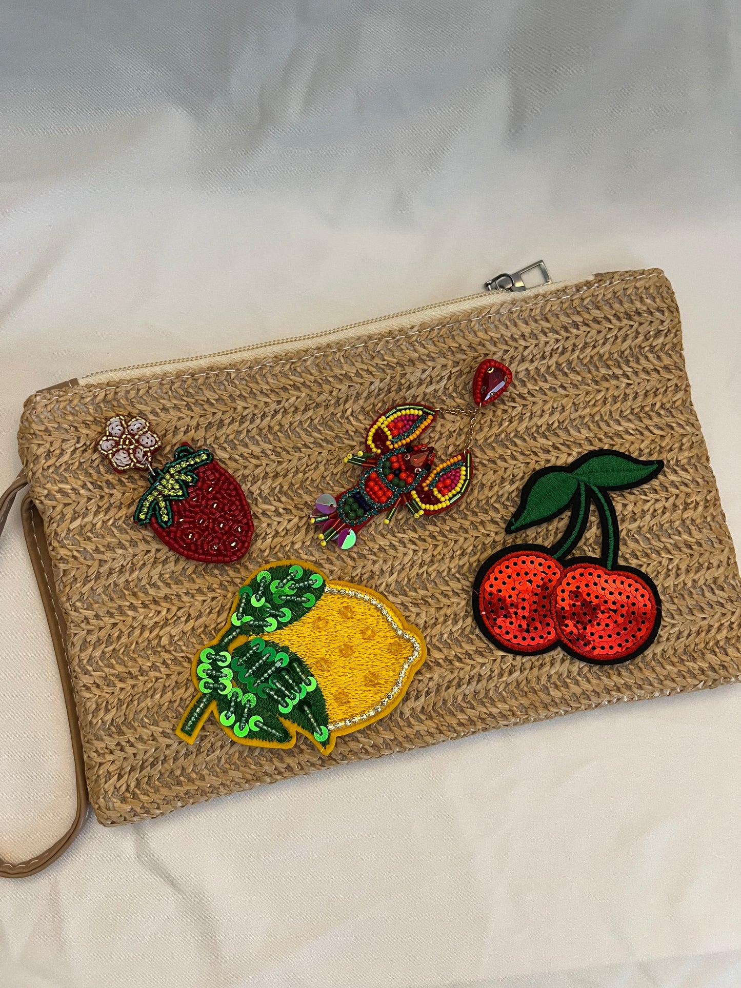 Straw charm bag